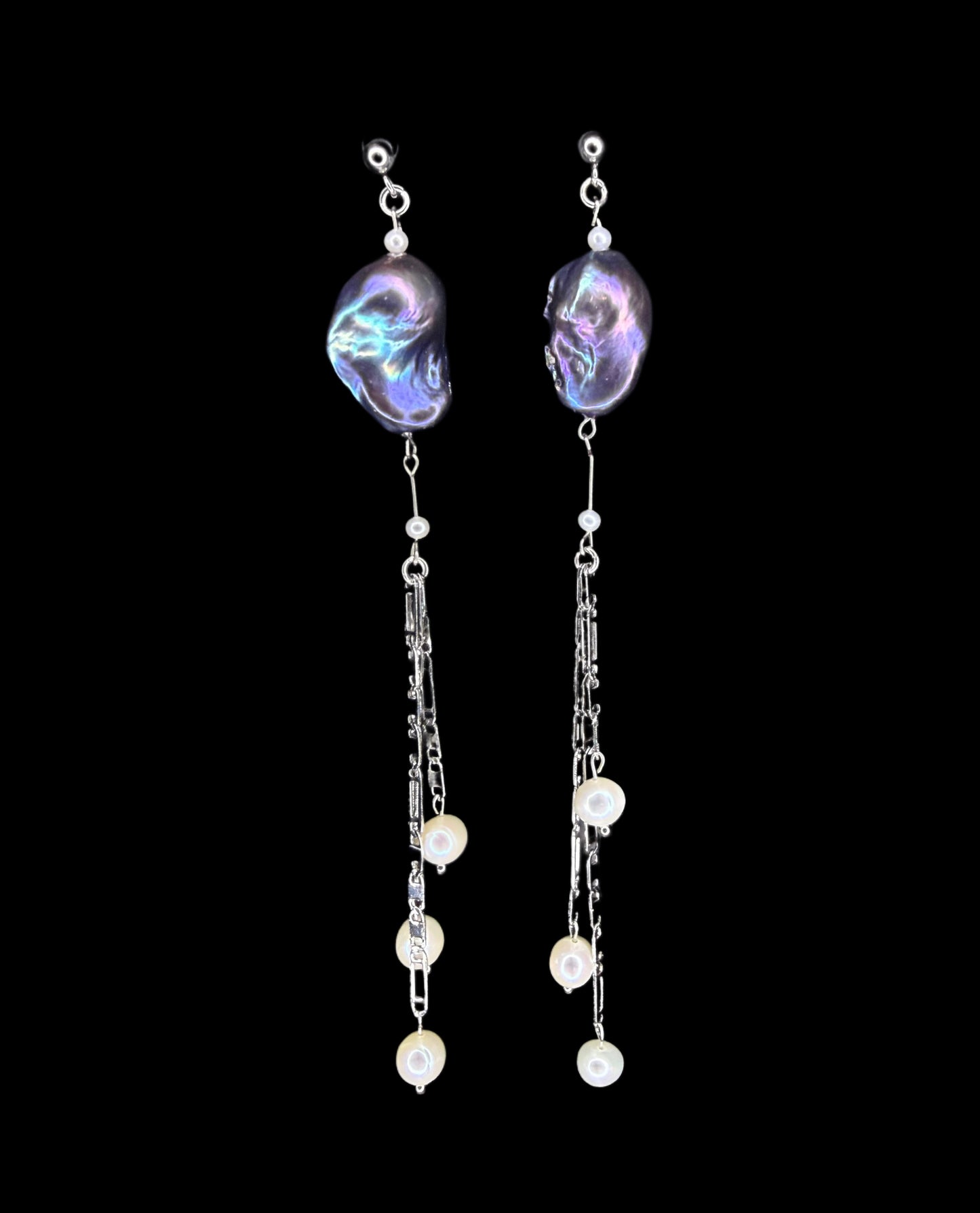 Space hiding in a sea rock earrings