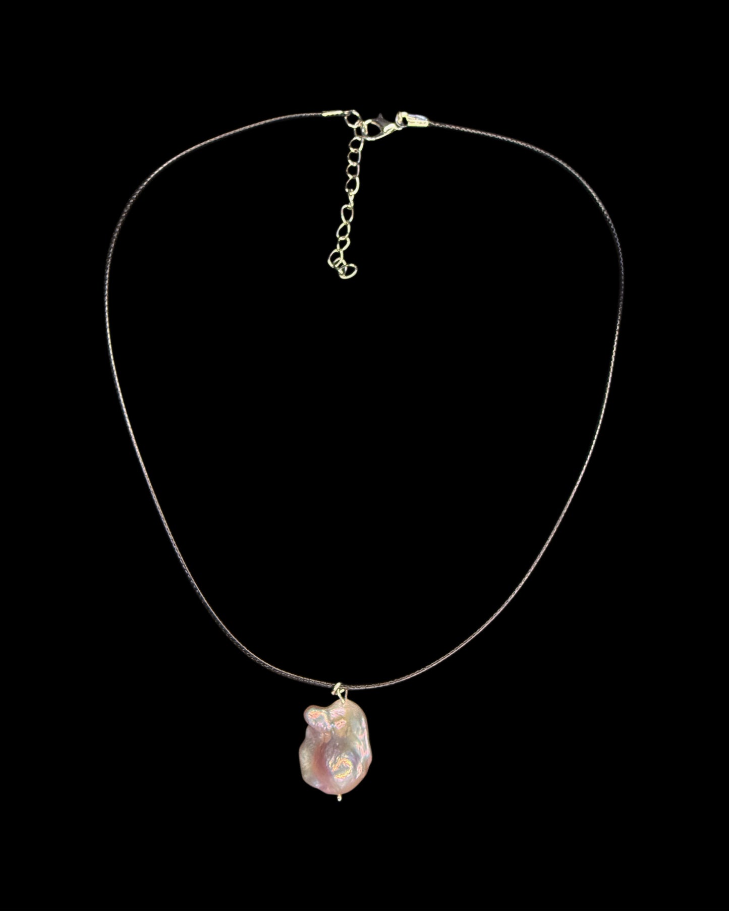 Dragon egg pendent on leather chain