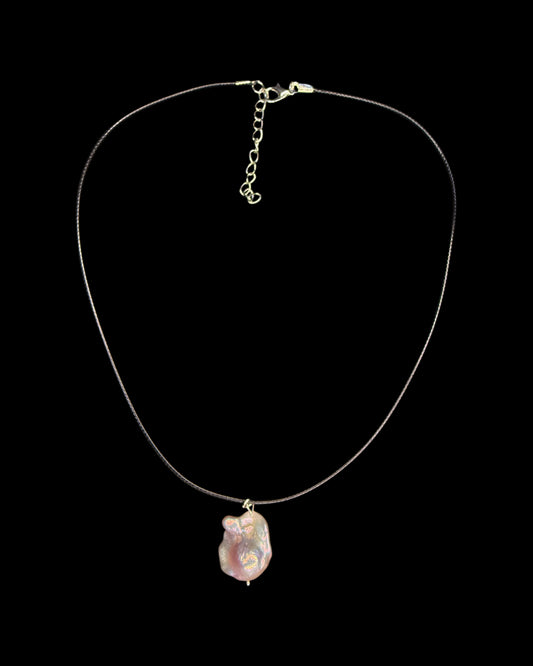 Dragon egg pendent on leather chain