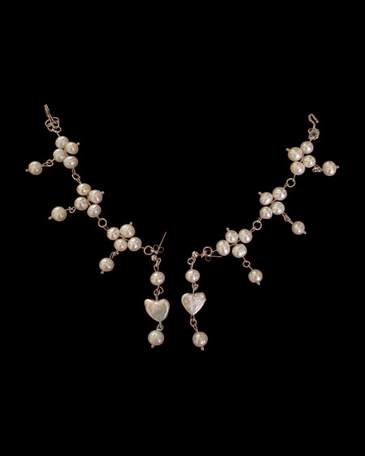 Clover pearl matil {ear chain}  does not include the earring :)