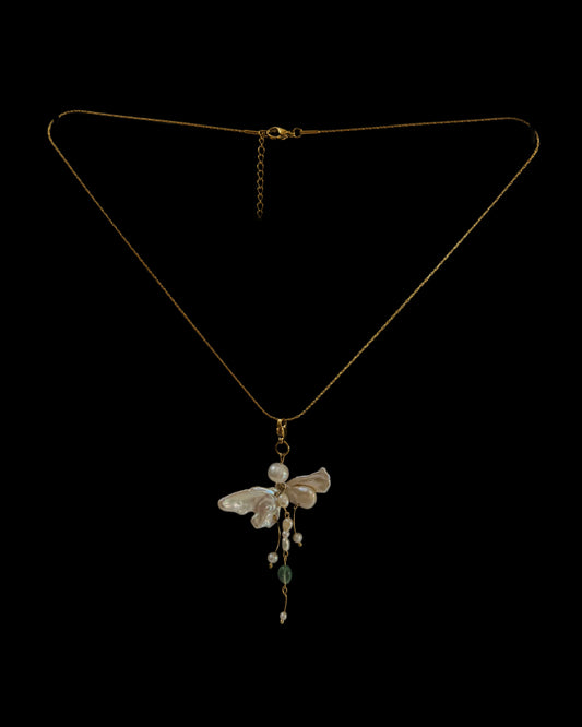 Butterfly charm necklace made with pearl