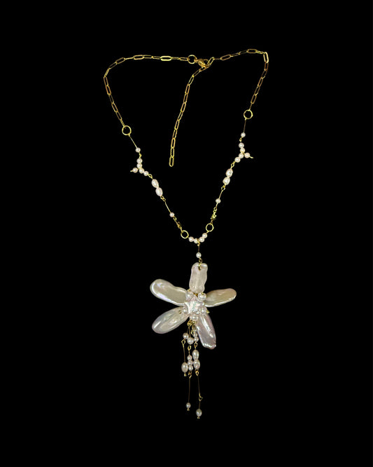 Gold thread of destiny with a flower on the side