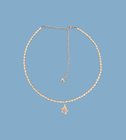 Tiny pearl with star drop {freshwater cultured pearl}