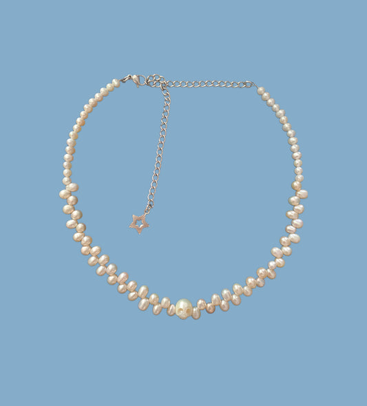 Carved skull pearl choker { freshwater cultured pearl}