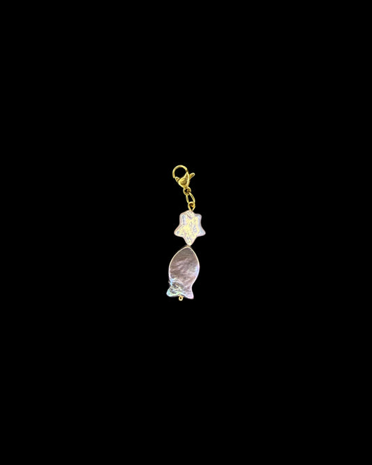 Fish eating star charm
