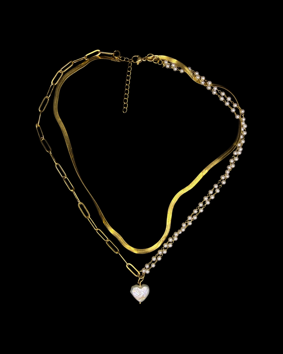 Tres chains with heart pendent